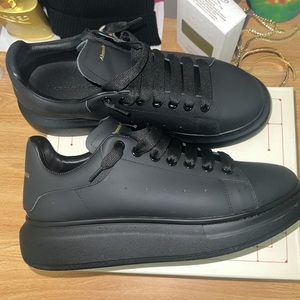 Alexander McQueen matte black sneakers